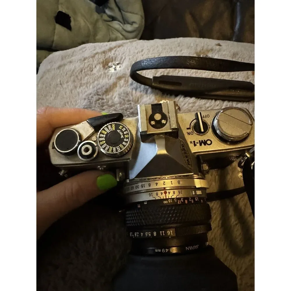Olympus OM-1n Camera in Chrome With 50mm 1:1.8 Auto S Lens